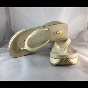 Volatile platform faux snake wedge flips faux 9